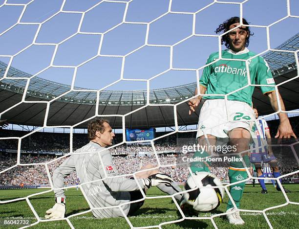 Claudio Pizarro of Bremen and Jaroslav Drobny of Bremen seen in action during the Bundesliga match between Hertha BSC Berlin and SV Werder Bremen at...