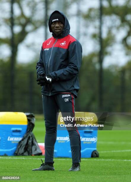 Claude Makelele, Swansea assistant coach watches the players train during the Swansea City Training at The Fairwood Training Ground on October 11,...