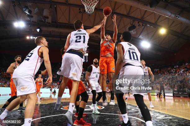 Stepehen Weight of the Taipans shoots during the round two NBL match between the Cairns Taipans and the Adelaide 36ers at Cairns Convention Centre on...