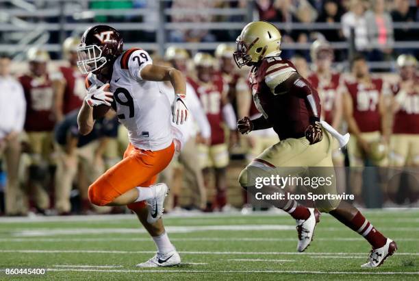 V29\ chased by Boston College linebacker John Lamot during a game between the Boston College Eagles and the Virginia Tech Hokies on October 7 at...