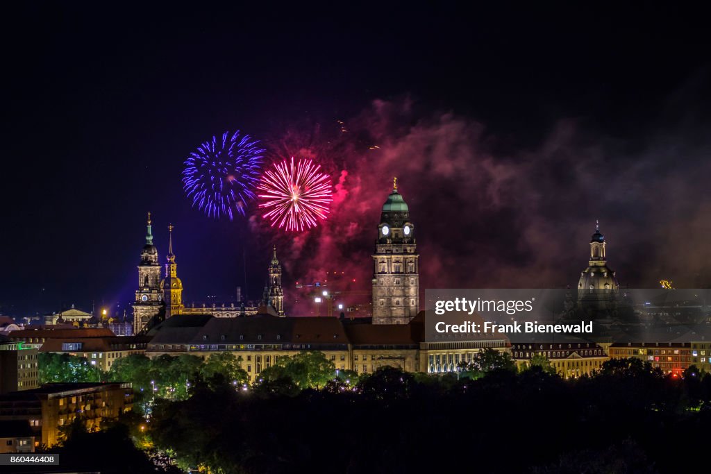 Aerial view on fireworks illuminating the old part of town...