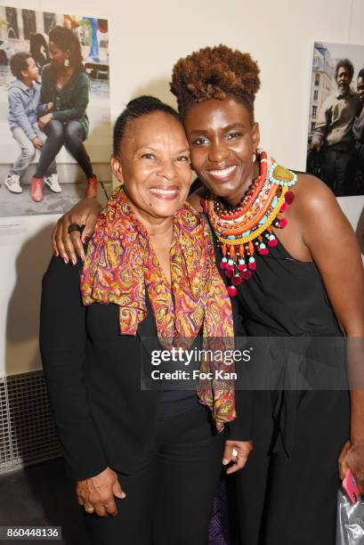 Rokhaya Diallo and former minister Christiane Taubira attend the "Afro" Rokhaya Diallo and photographer Brigitte Sombie Exhibition at Maison des...