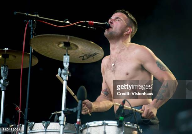 Lead singer with Slaves, Isaac Holman performs on the Main stage at Kendal Calling Festival at Lowther Deer Park on July 30, 2017 in Kendal, England.