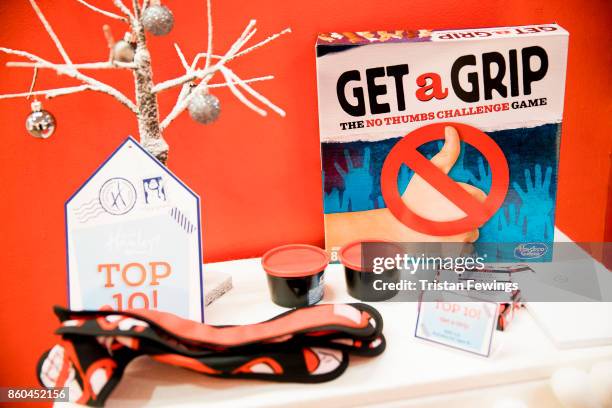 Hasbro's "no thumbs challenge" Get a Grip game is displayed as Hamley's announce it's top ten toys for Christmas at Hamleys on October 12, 2017 in...