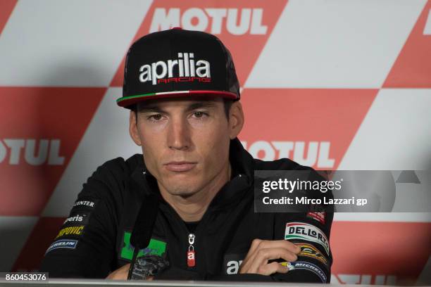 Aleix Espargaro of Spain and Aprilia Racing Team Gresini looks on during a press conference ahead of the MotoGP of Japan at Twin Ring Motegi on...