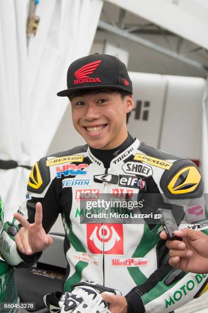 Ikuhiro Enokido of Japan and Teluro Motobum Racing Team smiles in the paddock before the press conference ahead of the MotoGP of Japan at Twin Ring...