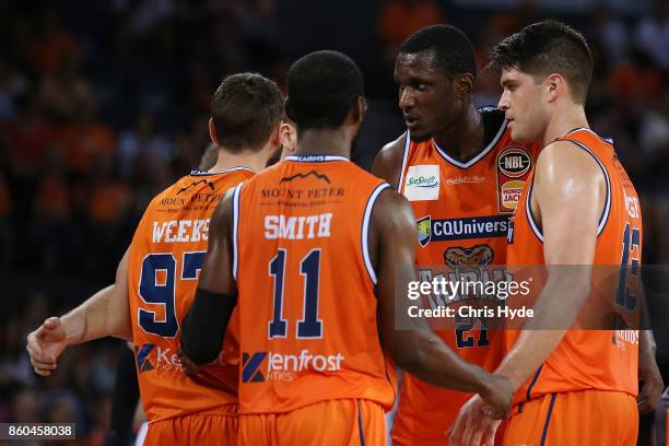 Taipans huddle during the round two NBL match between the Cairns Taipans and the Adelaide 36ers at Cairns Convention Centre on October 12, 2017 in...