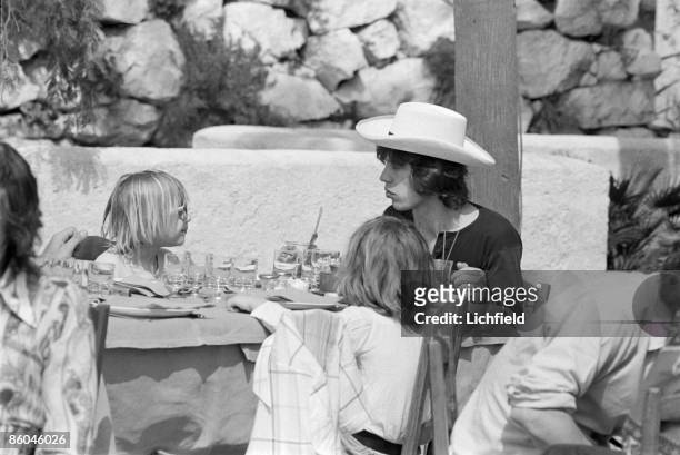 British rock musician Mick Jagger with Marlon Richards, son of British rock musician Keith Richards and Anita Pallenberg, before his marriage to...