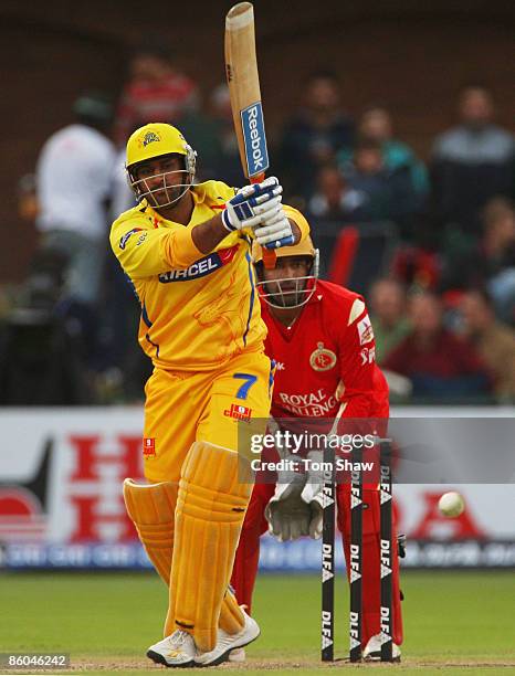 Mahendra Singh Dhoni of Chennai hits out during IPL T20 match between Chennai Super Kings and Royal Challengers Bangalore at St Georges Cricket...