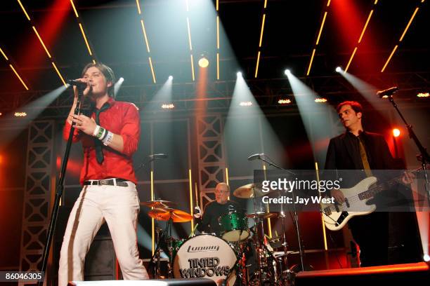 Singer Taylor Hanson, Drummer Bun E. Carlos and Bass player Adam Schlesinger of the new band Tinted Windows perform in concert on day 4 of the 2009...