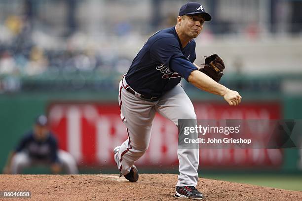 Javier Vazquez of the Atlanta Braves follows through on a pitch during the game against the Pittsburgh Pirates at PNC Park in Pittsburgh,...