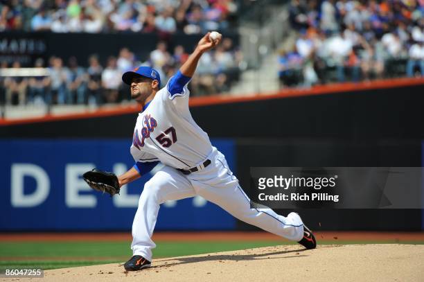 Johan Santana of the New York Mets pitches during the game against the Milwaukee Brewers at Citi Field in Flushing, New York on Saturday, April 18,...