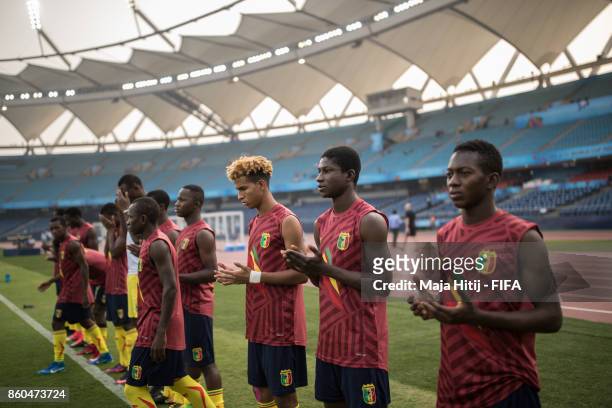 Players of Mali pray prior the FIFA U-17 World Cup India 2017 group A match between Mali and New Zealand at Jawaharlal Nehru Stadium on October 12,...