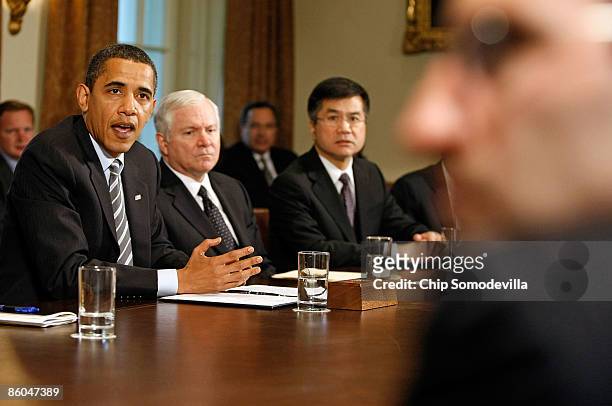 President Barack Obama makes a statement to the news media after conducting his first cabinet meeting with Defense Secretary Robert Gates and...