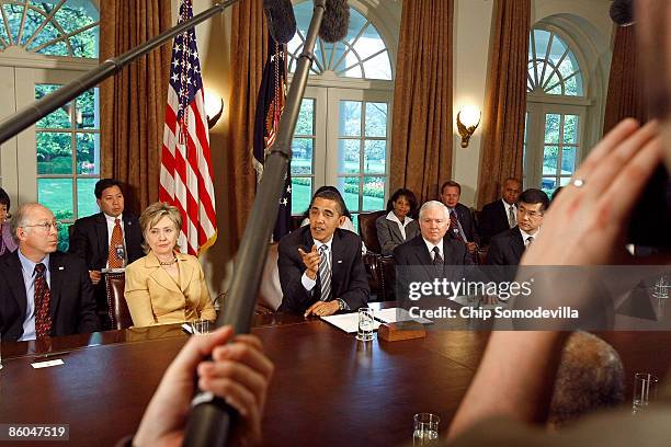 President Barack Obama answers a question from the news media after conducting his first cabinet meeting with Interior Secretary Ken Salazar,...