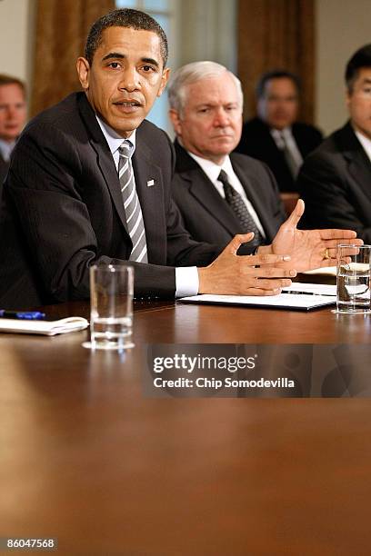 President Barack Obama makes a statement to the news media after conducting his first cabinet meeting with Defense Secretary Robert Gates and other...