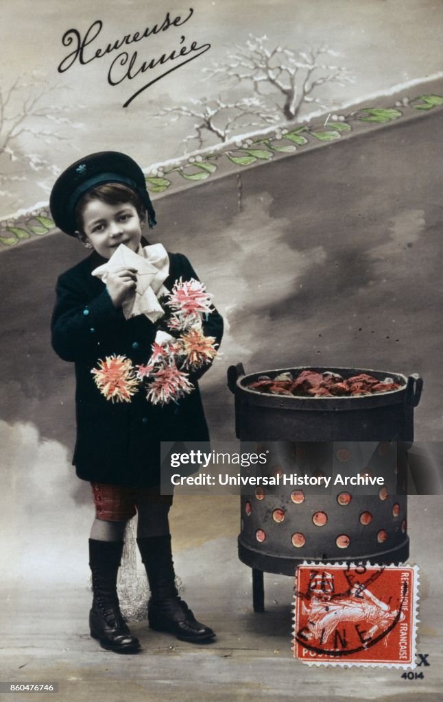 French Happy New Year, postcard depicting a boy with flowers standing near a hot brazier. 1900