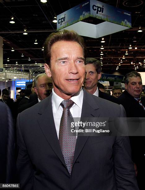 California Governor Arnold Schwarzenegger tours the exhibits at the 2009 Society of Engineers World Congress April 20, 2009 in Detroit, Michigan....