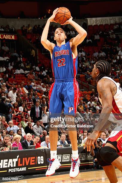 Tayshaun Prince of the Detroit Pistons shoots over Udonis Haslem of the Miami Heat during the game on February 24, 2009 at American Airlines Arena in...