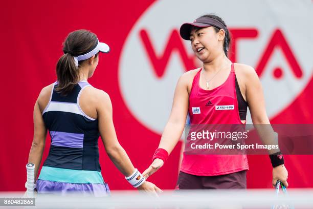 Eri Hozumi and Miyu Kato of Japan in action during the Prudential Hong Kong Tennis Open 2017 match between Katherine IP and Ling Zhang of Hong Kong...