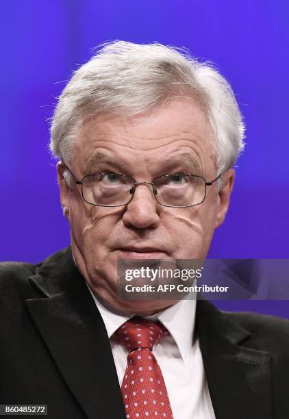 British Secretary of State for Exiting the European Union David Davis addresses media representatives at the European Union Commission in Brussels on...