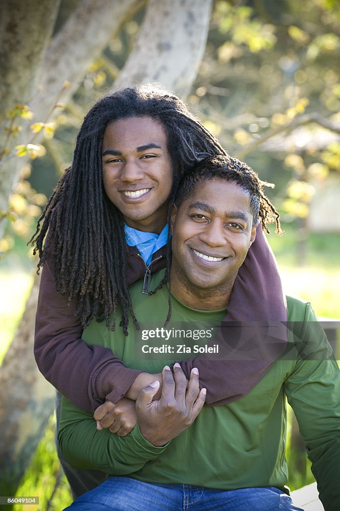 Affectionate Father/Son portrait outdoors