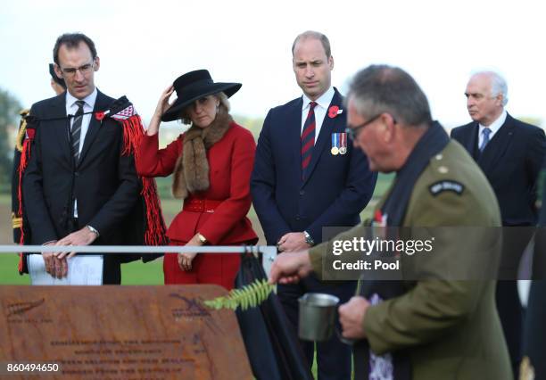 Prince William, Duke of Cambridge and Princess Astrid of Belgium watch as a commemorative plaque they unveiled is blessed, as they attend the New...