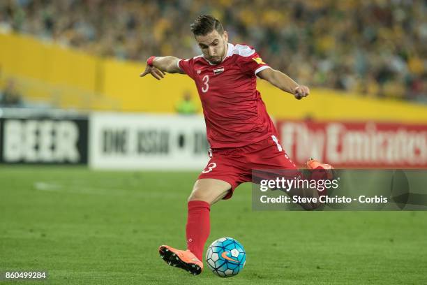 Mouaiad Al Ajjan of Syria crosses the ball during the 2018 FIFA World Cup Asian Playoff match between the Australian Socceroos and Syria at ANZ...