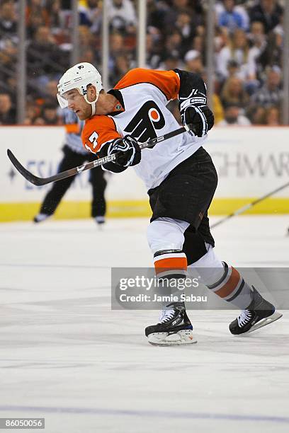 Forward Jeff Carter of the Philadelphia Flyers shoots the puck against the Pittsburgh Penguins during Game Two of the Eastern Conference...