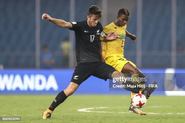 Matthew Palmer of New Zealand and Mamadi Fofana of Mali battle for the ball during the FIFA U-17 World Cup India 2017 group A match between Mali and...