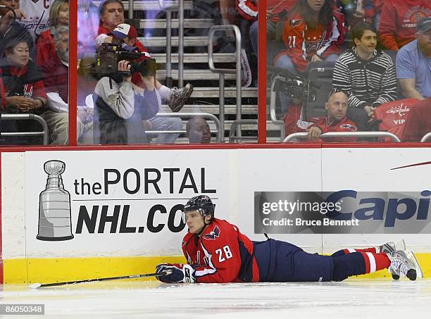 Alexander Semin of the Washington Capitals lands on the ice in his game against the New York Rangers during Game Two of the Eastern Conference...