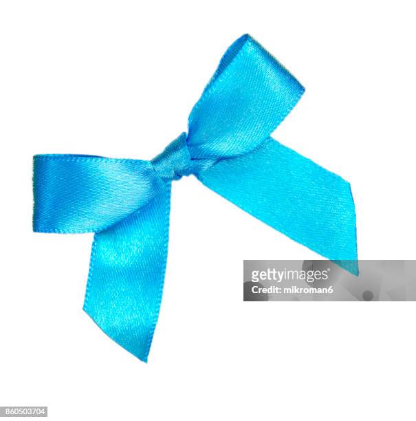blue ribbon on white background - bow stockfoto's en -beelden