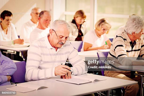 group of seniors on motivation seminar - old university stock pictures, royalty-free photos & images