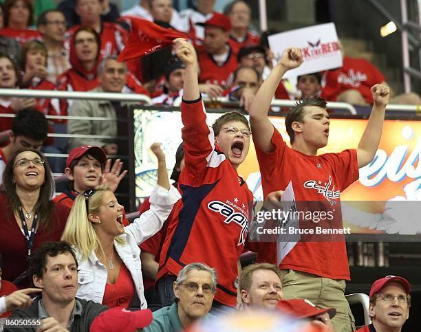 Fans of the Washington Capitals cheer their team on against the New York Rangers in Game Two of the Eastern Conference Quarterfinal Round of the 2009...