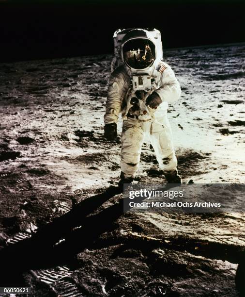 Apollo 11 astronaut Buzz Aldrin is photographed by Neil Armstrong as he stands by the lunar module on July 21, 1969 on the Moon.