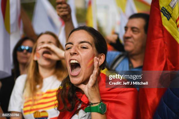 Thousands gather in Barcelona for a Spanish National Day Rally on October 12, 2017 in Barcelona, Spain. Spain marked its National Day with a show of...