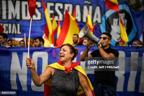 Thousands gather in Barcelona for a Spanish National Day Rally on October 12, 2017 in Barcelona, Spain. Spain marked its National Day with a show of...