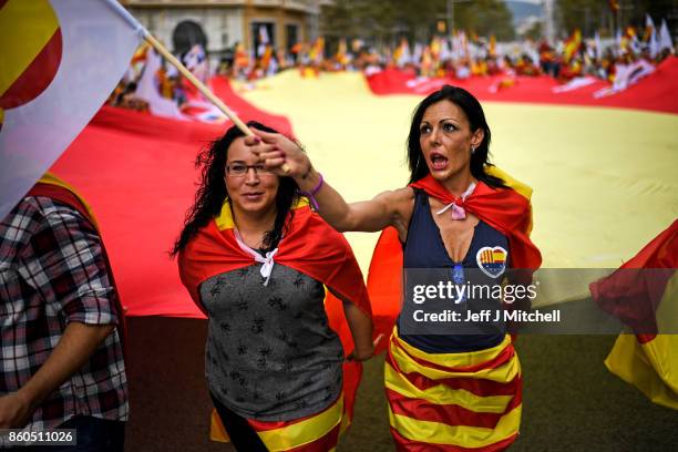 Thousands gather in Barcelona for a Spanish National Day Rally on October 12, 2017 in Barcelona, Spain. Spain marked its National Day with a show of...