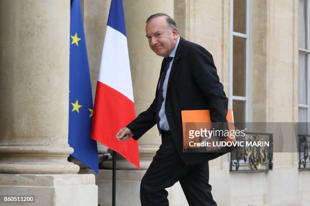 The head of the employers federation MEDEF, Pierre Gattaz arrives at the Elysee Palace in Paris on October 12, 2017 for a meeting with the French...