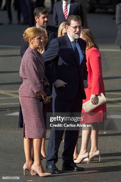 Spanish Minister of Defence Maria Doroles de Cospedal and Spanish Prime Minister Mariano Rajoy attend the National Day Military Parade 2017 on...