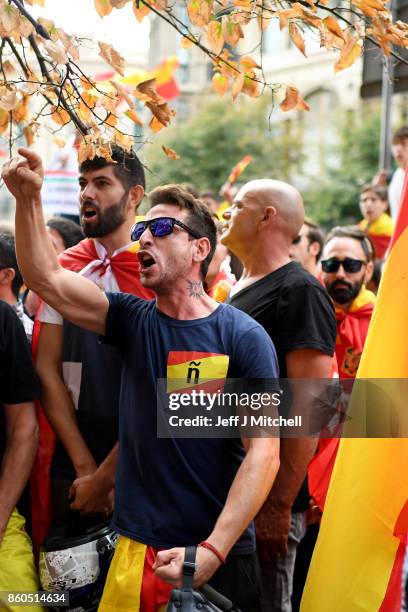 Thousands gather in Barcelona for a Spanish National Day Rally on October 12, 2017 in Barcelona, Spain. Spain marked its National Day with a show of...