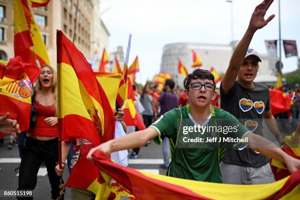 Thousands gather in Barcelona for a Spanish National Day Rally on October 12, 2017 in Barcelona, Spain. Spain marked its National Day with a show of...