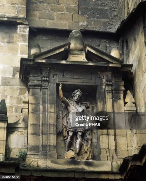 Eibar, province of Guipuzcoa, Basque Country, Spain. Sculptural detail of St. Michael in the facade of St. Andrew's Church, from medieval period and...