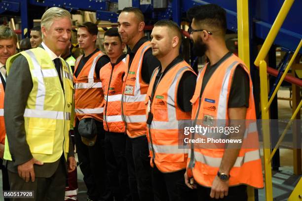 King Philippe pictured visiting the new baggage handling system developped by Deloitte Company.