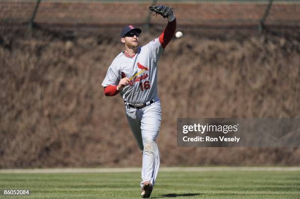 Chris Duncan of the St. Louis Cardinals misplays a fly ball for an error in the sixth inning against the Chicago Cubs on April 16, 2009 at Wrigley...