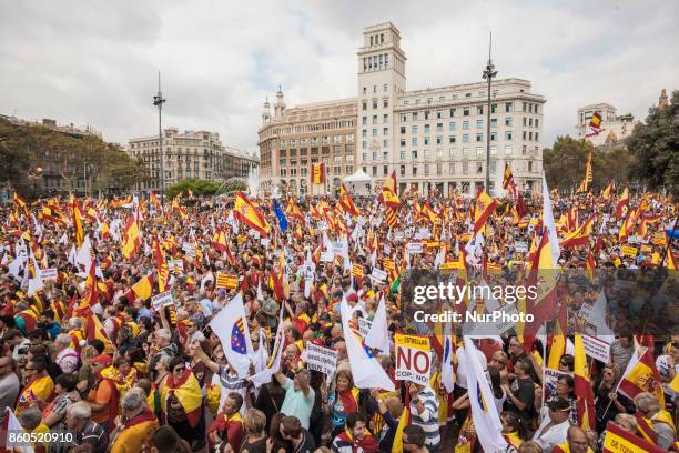 Thousands gather in Barcelona for a Spanish National Day Rally on October 12, 2017 in Barcelona, Spain. Spain marked its National Day with a show of...