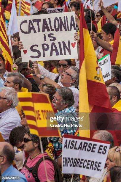 Thousands gather in Barcelona for a Spanish National Day Rally on October 12, 2017 in Barcelona, Spain. Spain marked its National Day with a show of...