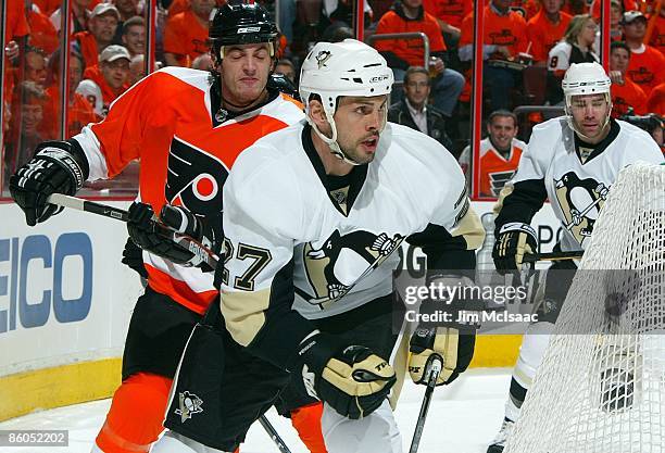 Craig Adams of the Pittsburgh Penguins skates against the Philadelphia Flyers during Game Three of the Eastern Conference Quarterfinal Round of the...