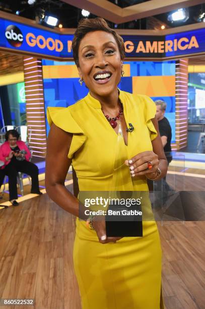 Good Morning America anchor Robin Roberts poses with the American Music Awards trophy during the 2017 American Music Awards nominations announcement...