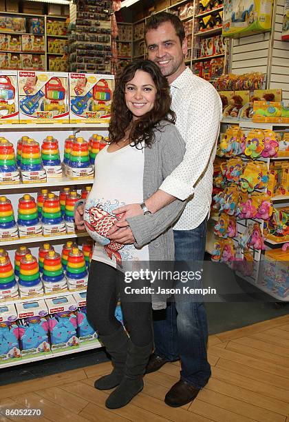 Actress Jessica Leccia and husband Brian Malloy shop at Buy Buy Baby on April 20, 2009 in New York City.